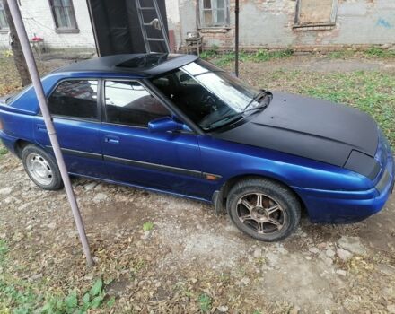 Синий Мазда 323, объемом двигателя 1.6 л и пробегом 10 тыс. км за 1426 $, фото 3 на Automoto.ua