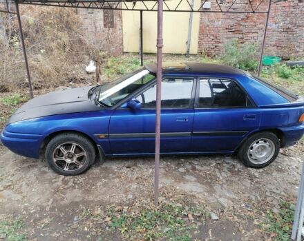 Синий Мазда 323, объемом двигателя 1.6 л и пробегом 10 тыс. км за 1426 $, фото 2 на Automoto.ua