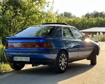 Синій Мазда 323, об'ємом двигуна 1.8 л та пробігом 435 тис. км за 3400 $, фото 2 на Automoto.ua