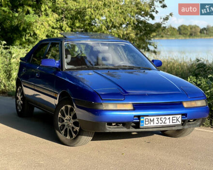 Синій Мазда 323, об'ємом двигуна 1.8 л та пробігом 435 тис. км за 3400 $, фото 5 на Automoto.ua