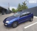 Синій Мазда 323, об'ємом двигуна 1.5 л та пробігом 317 тис. км за 1750 $, фото 1 на Automoto.ua