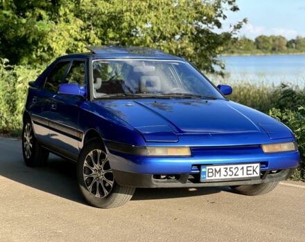 Синій Мазда 323, об'ємом двигуна 1.8 л та пробігом 435 тис. км за 3400 $, фото 5 на Automoto.ua