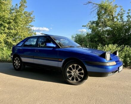 Синій Мазда 323, об'ємом двигуна 1.8 л та пробігом 435 тис. км за 3400 $, фото 1 на Automoto.ua
