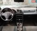 Синій Мазда 323, об'ємом двигуна 1.49 л та пробігом 100 тис. км за 350 $, фото 9 на Automoto.ua