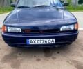 Синій Мазда 323, об'ємом двигуна 1.3 л та пробігом 259 тис. км за 1000 $, фото 1 на Automoto.ua