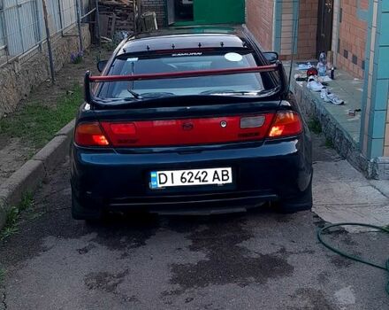 Синій Мазда 323, об'ємом двигуна 19 л та пробігом 333 тис. км за 2100 $, фото 3 на Automoto.ua