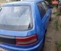 Синій Мазда 323, об'ємом двигуна 1.32 л та пробігом 300 тис. км за 650 $, фото 4 на Automoto.ua
