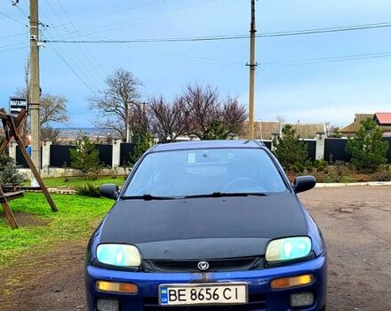 Синій Мазда 323, об'ємом двигуна 1.3 л та пробігом 200 тис. км за 1150 $, фото 1 на Automoto.ua
