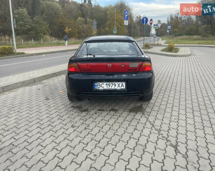 Синий Мазда 323, объемом двигателя 1.84 л и пробегом 227 тыс. км за 2899 $, фото 3 на Automoto.ua