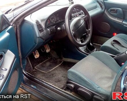 Синий Мазда 323, объемом двигателя 1.5 л и пробегом 270 тыс. км за 2500 $, фото 5 на Automoto.ua