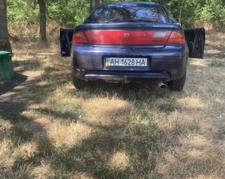 Синий Мазда 323, объемом двигателя 1.5 л и пробегом 350 тыс. км за 1350 $, фото 1 на Automoto.ua