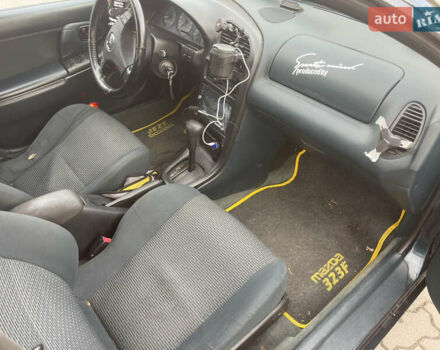 Синий Мазда 323, объемом двигателя 1.84 л и пробегом 227 тыс. км за 2899 $, фото 6 на Automoto.ua