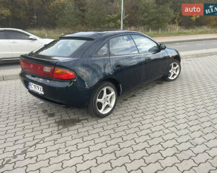 Синий Мазда 323, объемом двигателя 1.84 л и пробегом 227 тыс. км за 2899 $, фото 4 на Automoto.ua