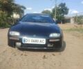 Синий Мазда 323, объемом двигателя 1.5 л и пробегом 400 тыс. км за 1500 $, фото 1 на Automoto.ua