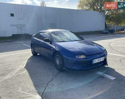 Синій Мазда 323, об'ємом двигуна 1.49 л та пробігом 285 тис. км за 1700 $, фото 1 на Automoto.ua
