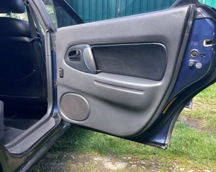 Синий Мазда 323, объемом двигателя 1.5 л и пробегом 350 тыс. км за 3300 $, фото 18 на Automoto.ua