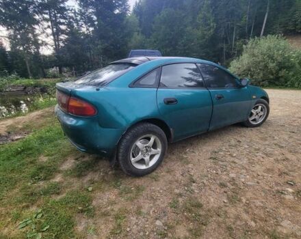 Синій Мазда 323, об'ємом двигуна 0 л та пробігом 230 тис. км за 1200 $, фото 1 на Automoto.ua