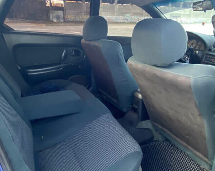 Синій Мазда 323, об'ємом двигуна 1.49 л та пробігом 285 тис. км за 1700 $, фото 6 на Automoto.ua