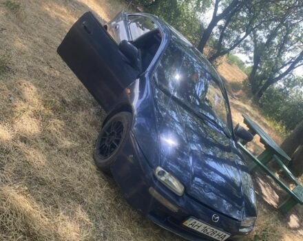 Синий Мазда 323, объемом двигателя 1.5 л и пробегом 350 тыс. км за 1350 $, фото 4 на Automoto.ua