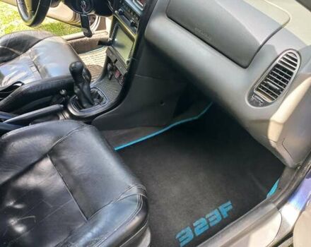 Синий Мазда 323, объемом двигателя 1.5 л и пробегом 350 тыс. км за 3300 $, фото 12 на Automoto.ua