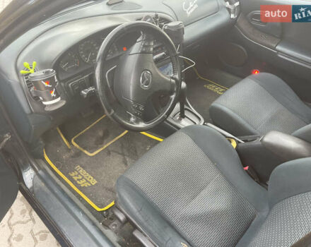 Синий Мазда 323, объемом двигателя 1.84 л и пробегом 227 тыс. км за 2899 $, фото 7 на Automoto.ua
