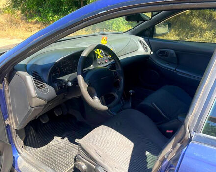 Синий Мазда 323, объемом двигателя 1.5 л и пробегом 400 тыс. км за 2000 $, фото 8 на Automoto.ua