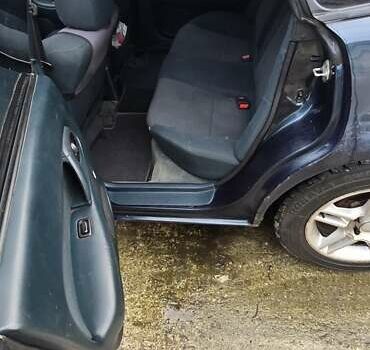 Синий Мазда 323, объемом двигателя 1.5 л и пробегом 237 тыс. км за 2200 $, фото 3 на Automoto.ua