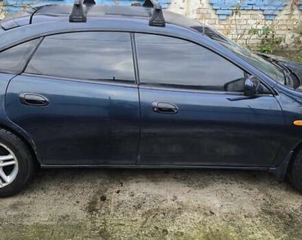 Синий Мазда 323, объемом двигателя 1.5 л и пробегом 237 тыс. км за 2200 $, фото 4 на Automoto.ua