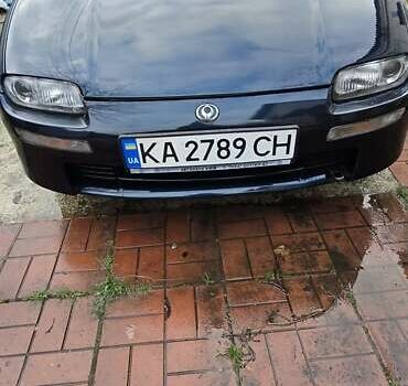 Синий Мазда 323, объемом двигателя 1.5 л и пробегом 237 тыс. км за 2200 $, фото 1 на Automoto.ua