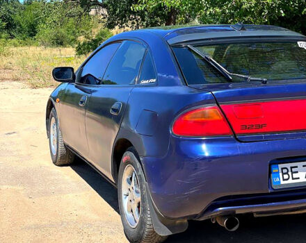 Синий Мазда 323, объемом двигателя 1.5 л и пробегом 400 тыс. км за 2000 $, фото 4 на Automoto.ua
