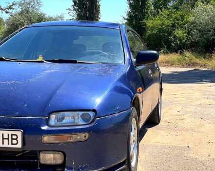 Синий Мазда 323, объемом двигателя 1.5 л и пробегом 400 тыс. км за 2000 $, фото 5 на Automoto.ua