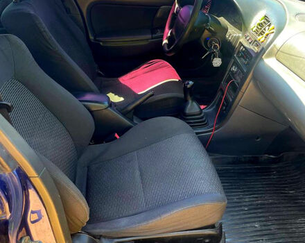 Синий Мазда 323, объемом двигателя 1.5 л и пробегом 400 тыс. км за 2000 $, фото 9 на Automoto.ua