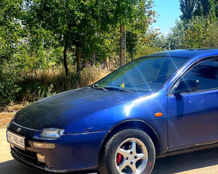 Синий Мазда 323, объемом двигателя 1.5 л и пробегом 400 тыс. км за 2000 $, фото 1 на Automoto.ua