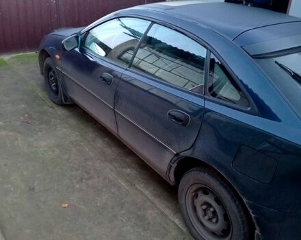 Синий Мазда 323, объемом двигателя 1.5 л и пробегом 235 тыс. км за 1600 $, фото 1 на Automoto.ua