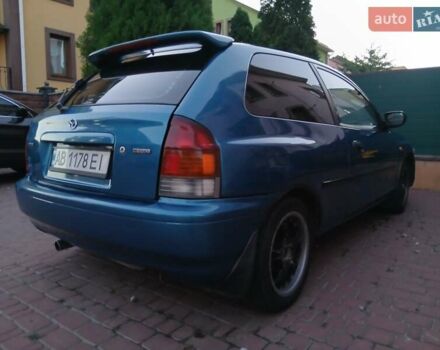 Синий Мазда 323, объемом двигателя 1.5 л и пробегом 332 тыс. км за 3000 $, фото 13 на Automoto.ua