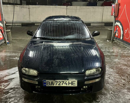 Синій Мазда 323, об'ємом двигуна 1.49 л та пробігом 343 тис. км за 2100 $, фото 1 на Automoto.ua