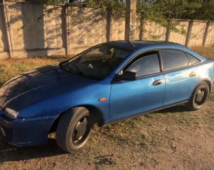 Синий Мазда 323, объемом двигателя 1.5 л и пробегом 388 тыс. км за 1800 $, фото 1 на Automoto.ua