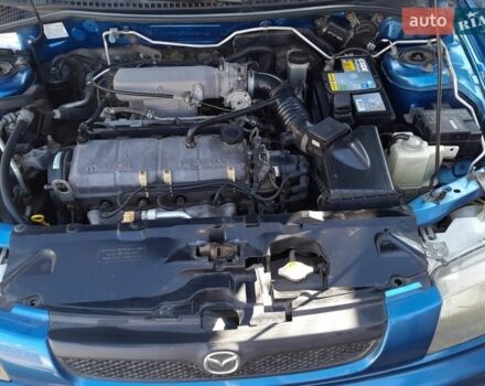 Синій Мазда 323, об'ємом двигуна 1.3 л та пробігом 228 тис. км за 2000 $, фото 8 на Automoto.ua
