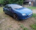 Синий Мазда 323, объемом двигателя 0 л и пробегом 200 тыс. км за 1003 $, фото 2 на Automoto.ua
