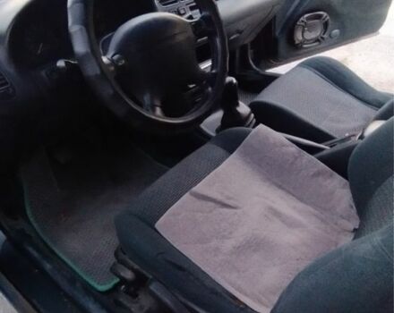 Синий Мазда 323, объемом двигателя 1 л и пробегом 200 тыс. км за 2150 $, фото 2 на Automoto.ua