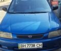 Синій Мазда 323, об'ємом двигуна 1.3 л та пробігом 228 тис. км за 2000 $, фото 1 на Automoto.ua