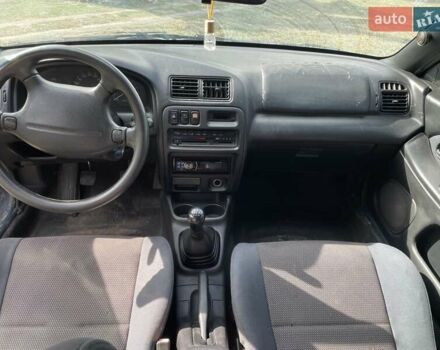 Синий Мазда 323, объемом двигателя 1.5 л и пробегом 250 тыс. км за 1900 $, фото 4 на Automoto.ua