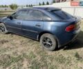 Синий Мазда 323, объемом двигателя 1.5 л и пробегом 250 тыс. км за 1900 $, фото 1 на Automoto.ua