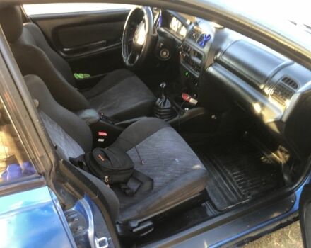 Синий Мазда 323, объемом двигателя 1.5 л и пробегом 388 тыс. км за 1800 $, фото 4 на Automoto.ua