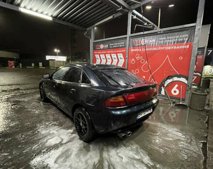 Синій Мазда 323, об'ємом двигуна 1.49 л та пробігом 343 тис. км за 2100 $, фото 2 на Automoto.ua