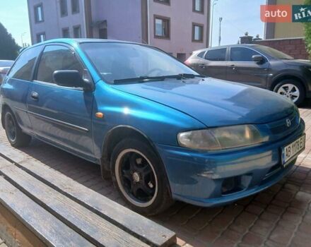 Синий Мазда 323, объемом двигателя 1.5 л и пробегом 332 тыс. км за 3000 $, фото 5 на Automoto.ua