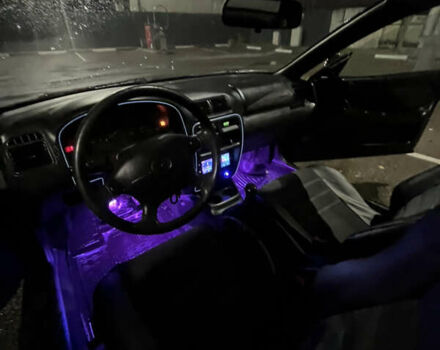 Синій Мазда 323, об'ємом двигуна 1.49 л та пробігом 343 тис. км за 2100 $, фото 11 на Automoto.ua