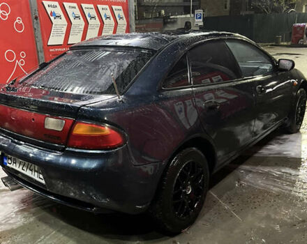 Синій Мазда 323, об'ємом двигуна 1.49 л та пробігом 343 тис. км за 2100 $, фото 3 на Automoto.ua