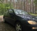 Синій Мазда 323, об'ємом двигуна 1.5 л та пробігом 369 тис. км за 1100 $, фото 1 на Automoto.ua