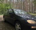 Синій Мазда 323, об'ємом двигуна 1.5 л та пробігом 369 тис. км за 930 $, фото 1 на Automoto.ua